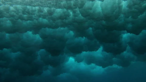 Male Surfer Falling In Cloudy Patterned Undersea While Surfing During Vacation - Stock Footage 234079073