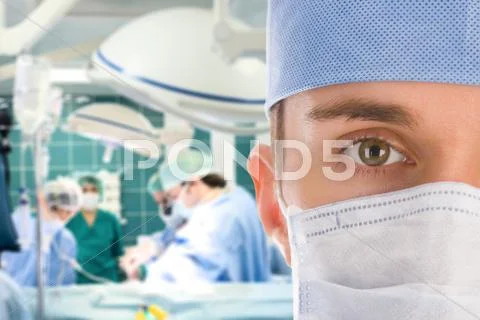 Male surgeon with his team Stock Photos