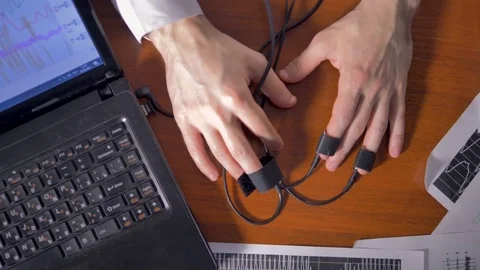 Male suspects hands shaking as seen from above. Stock Footage 78295887