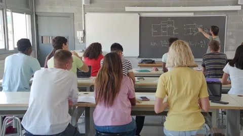 Male teacher explaining science class in a classroom Stock Footage 201588658