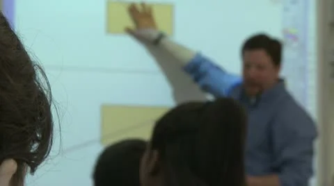 Male teacher in front of class Video stock 8978893
