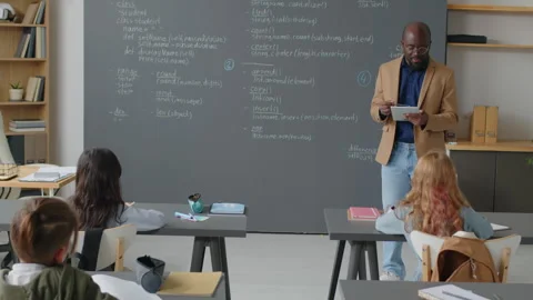 Male Teacher Giving Lecture on Programming 스톡 동영상 244695448