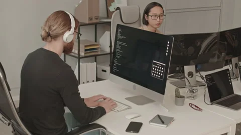 Male Team of Programmers Working in Office Video stock 165718760