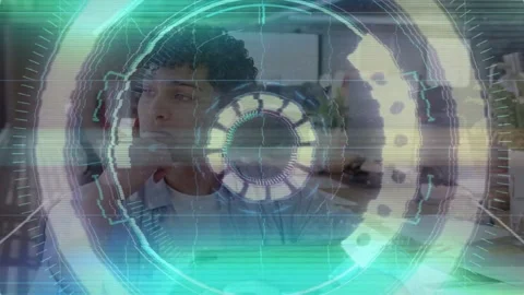 Male tech designer tapping tablet, pausing to think, returning, refining Stock Footage 333837425