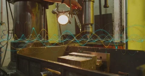 Male tech hand adjusting coolant nozzle, pulling feed lever, causing spray Stock Footage 330602896