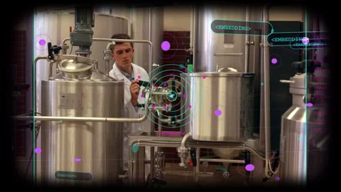 Male tech moving to tanks adjusting valve and monitoring process with purple Stock Footage 333034833
