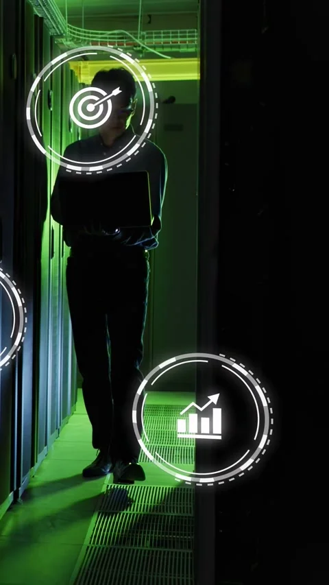 Male tech walking server aisle, opening laptop and showing HUDs overlapping Stock Footage 332806310
