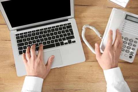 Male technical support operator working in office, closeup of hands Stock Photos