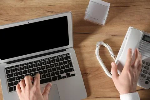 Male technical support operator working in office, closeup of hands Stock Photos