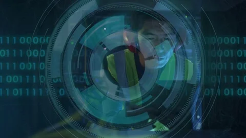 Male technician tapping tablet, scanning rack for check in server room, HUD Stock Footage 332591943