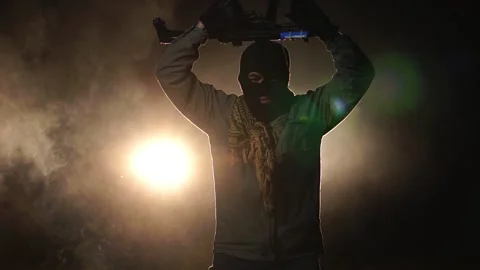 Male terrorists are causing riots at night Stock-Footage 220139432