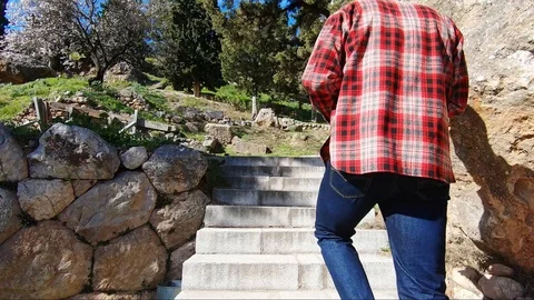 Male tourist exploring Delphi in Greece Stockbeeldmateriaal 125956953