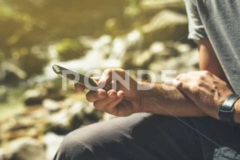 Male tourist using mobile smart phone for GPS navigation Stock Photos