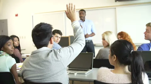 Male Tutor Teaching University Students In Classroom Stock Footage 40447658