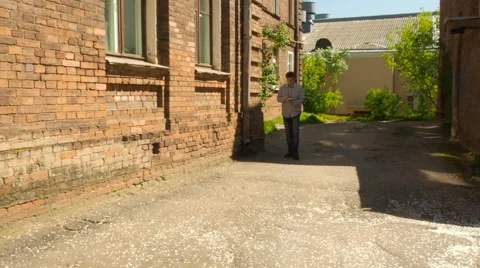 Male use tablet PC to find way in city Stock Footage 63146223