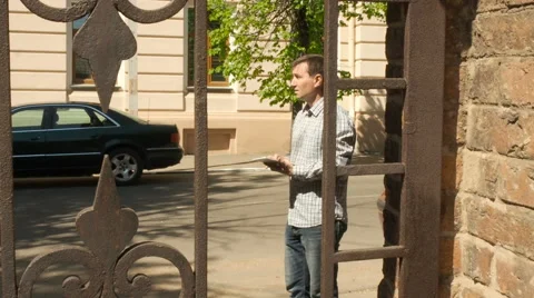Male use tablet PC to find way in city Stock Footage 63146851