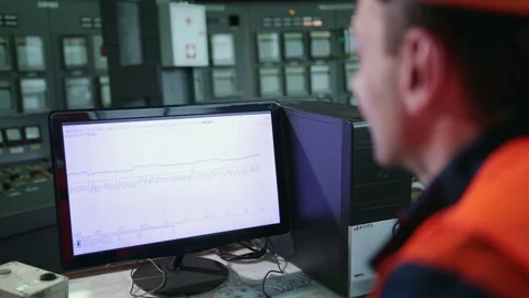 Male uses computer showing system monitoring, controlling program. 스톡 동영상 145996920