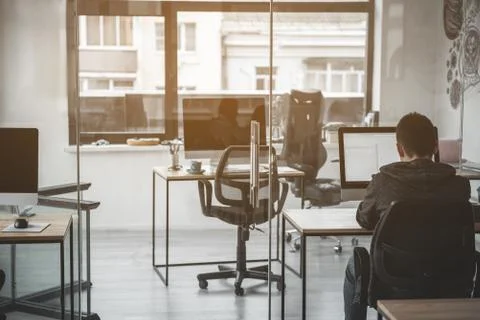 Male using computer at labor Stock Photos