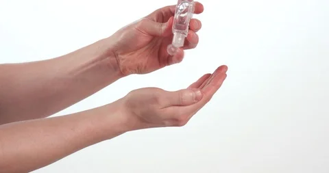 Male Using Hand Sanitizer / Sanitizing Gel to Kill Virus / Germs Vidéo 129580110