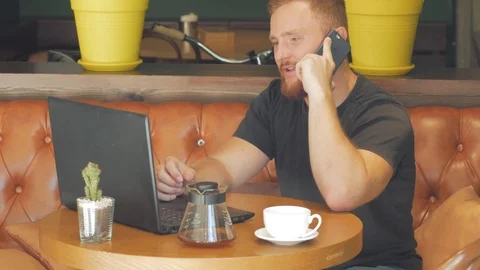 Male using laptop in cafe Stock Footage 95217716