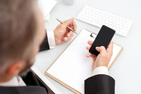Male using smartphone Stock Photos