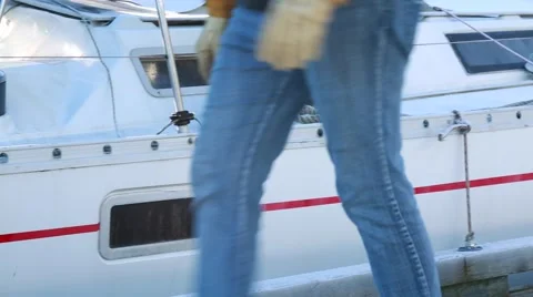 Male walking on boat deck Stock Footage 58681084