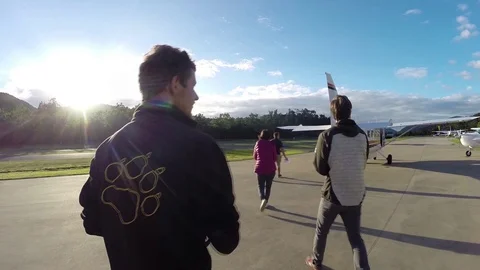 Male walking torwards small engine air plane Video stock 71443220