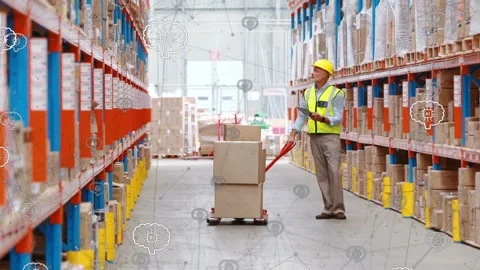 Male warehouse worker scanning tablet, pulling red pallet jack to move boxes, AI Stock Footage 333510015