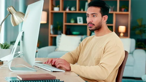 A male web designer typing code for an internet website working from home. A 스톡 동영상 201657969