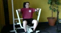 Male on weights machine at the gym HD Footage
