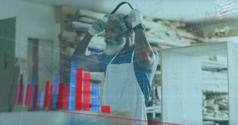 Male woodworker lifting earmuffs causing data chart removing them grabbing Stock Footage 312005937