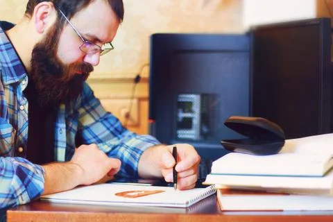 Male work computer pen write Foto stock