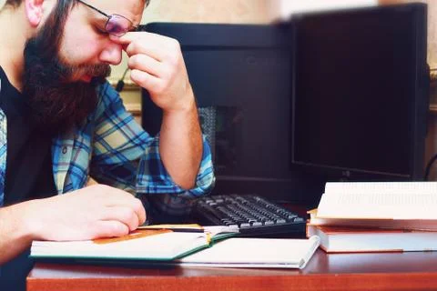 Male work computer pen write Foto stock
