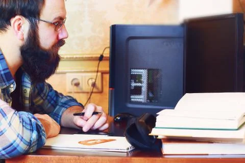 Male work computer pen write Foto stock
