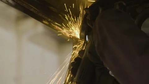 Male worker with angular grinding machine Video stock 98639336