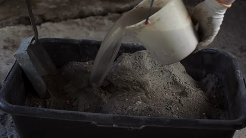 Male Worker Builder Guest Worker Mixes Cement Mortar Stock Footage 129341096