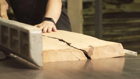 Male worker hands processing wood using machine tool. Furniture manufacture Stock Footage 135675113