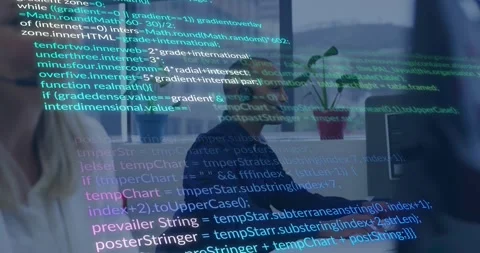 Male worker headset typing and starting scrolling code overlay obscuring team Video stock 328485870