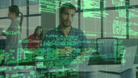 Male worker in office reading printed sheet and causing code grid fading for Stock Footage 330256177