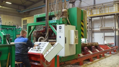 Male worker operator presses the buttons, controls, works with machine-tool Stock-Footage 95834170