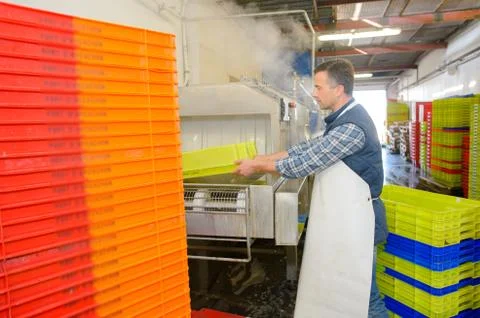 Male worker is preparing the crate Stock Photos
