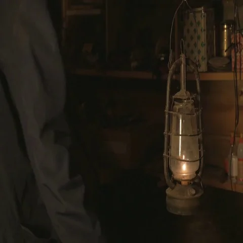 Male worker puts things in order in his workshop after work , 4K Stock Footage 69736742