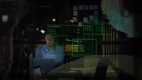 Male worker reacting to NODE_B7 alert, rubbing temple, typing while fixing green Stock Footage 333062442