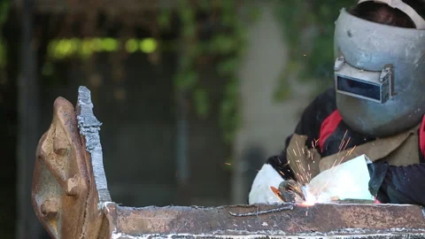 Male worker welding argon. Welding with argon or electrode, using a welding.. Stock Footage 336942252