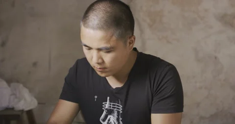 Male Working down ways facing Stock Footage 141366895