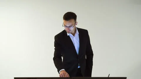 The male working with a touchscreen on the white background Stock Footage 100564500