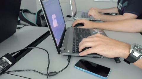 Males are focused on their work on graphic design Stock Footage 65219959