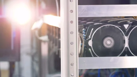 Male's hand checking power of graphic processing units with a wattmeter Stock Footage 88547450