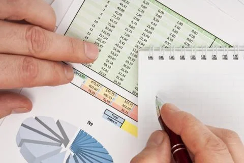 Males hand writing in the document Foto stock