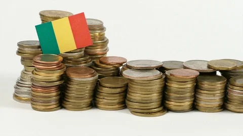 Malian flag waving with stack of money coins Video stock 71985253